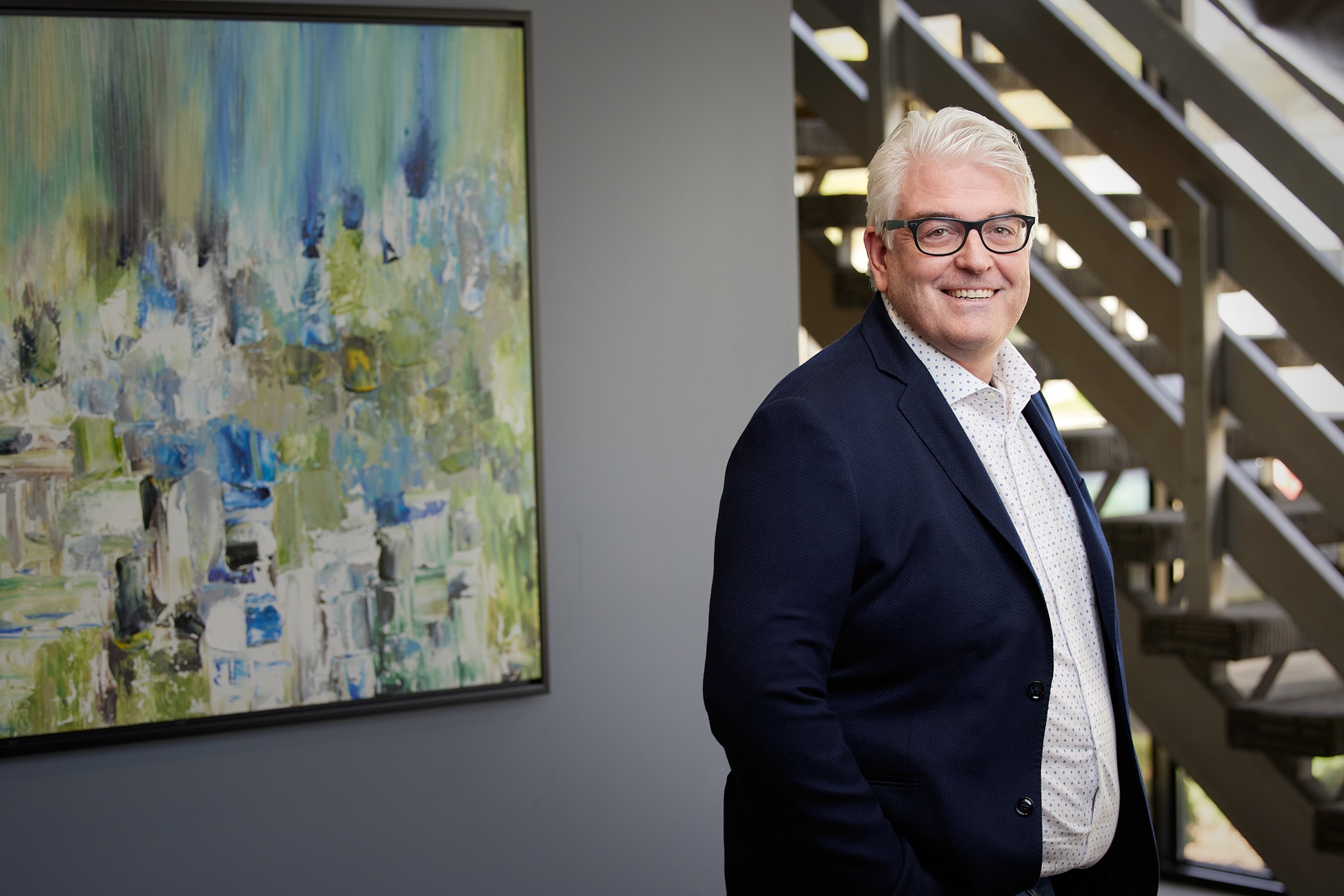 An image of Tom Getliffe CPA, a partner at Ford Keast LLP in the reception area of the London Ontario accounting office