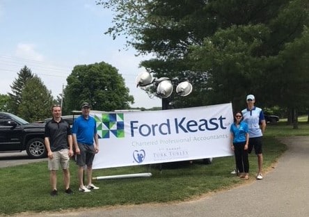 Four Ford Keast LLP team members at the Turk Turley Memorial Golf Tournament