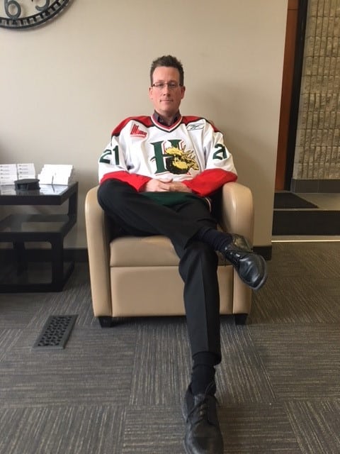 A Ford Keast LLP staff member wearing his jersey for Humboldt