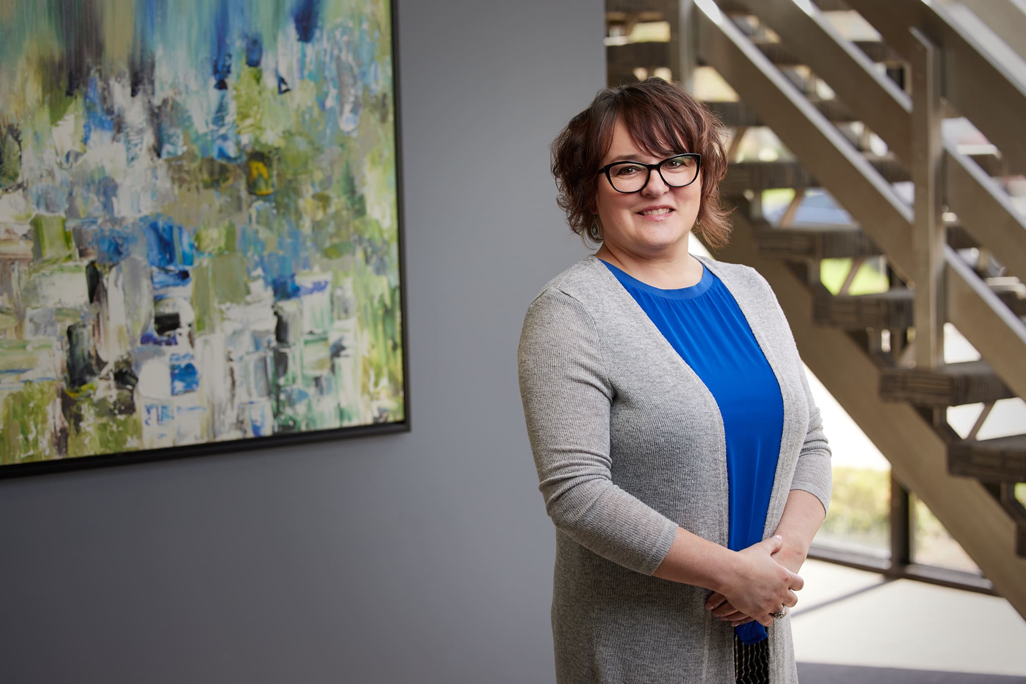 An image of Dorota Kral, Administration Assistant standing in the Ford Keast LLP London, Ontario office.