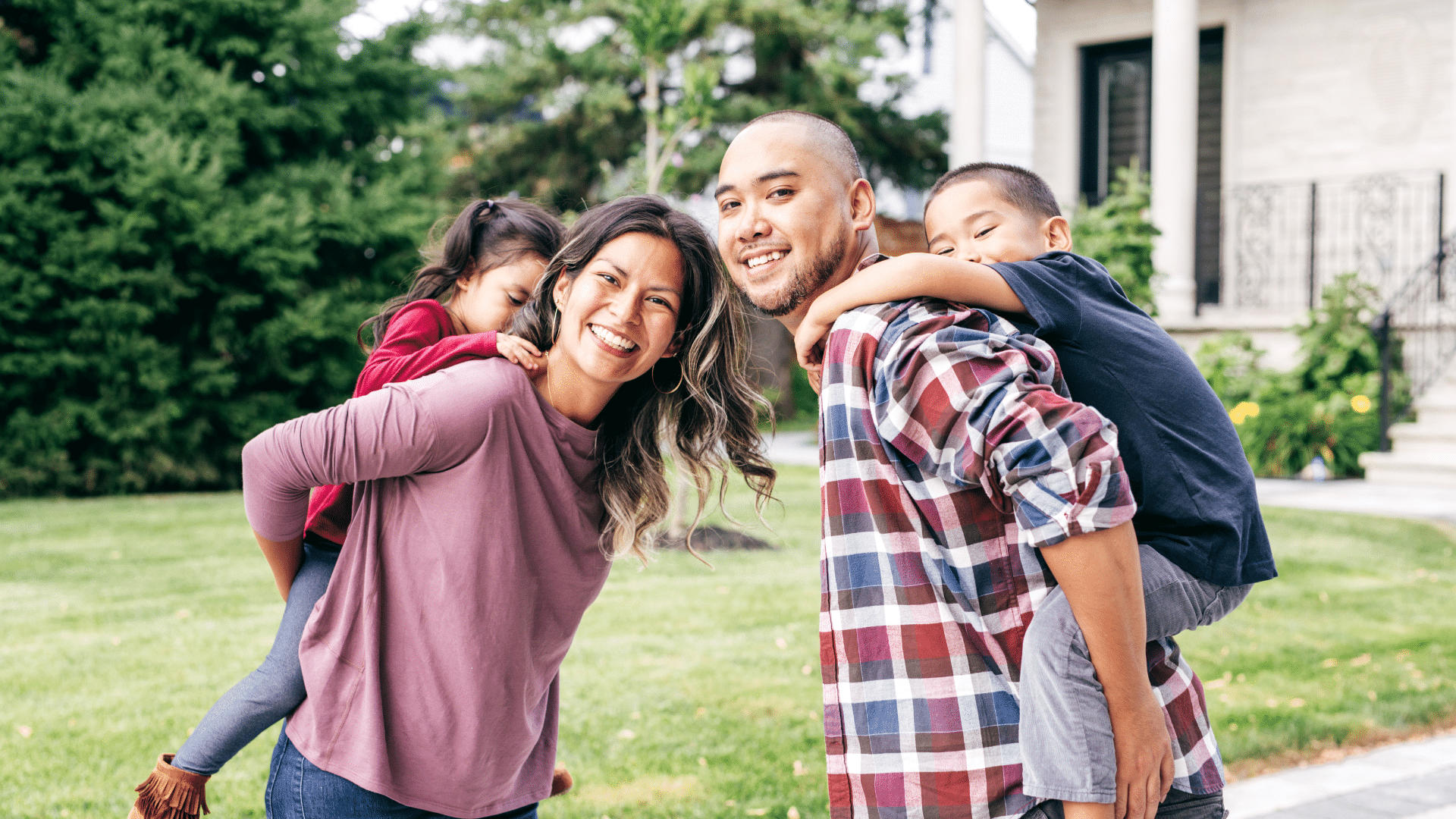 An image of a young family who is considering insurance as part of their estate plan.