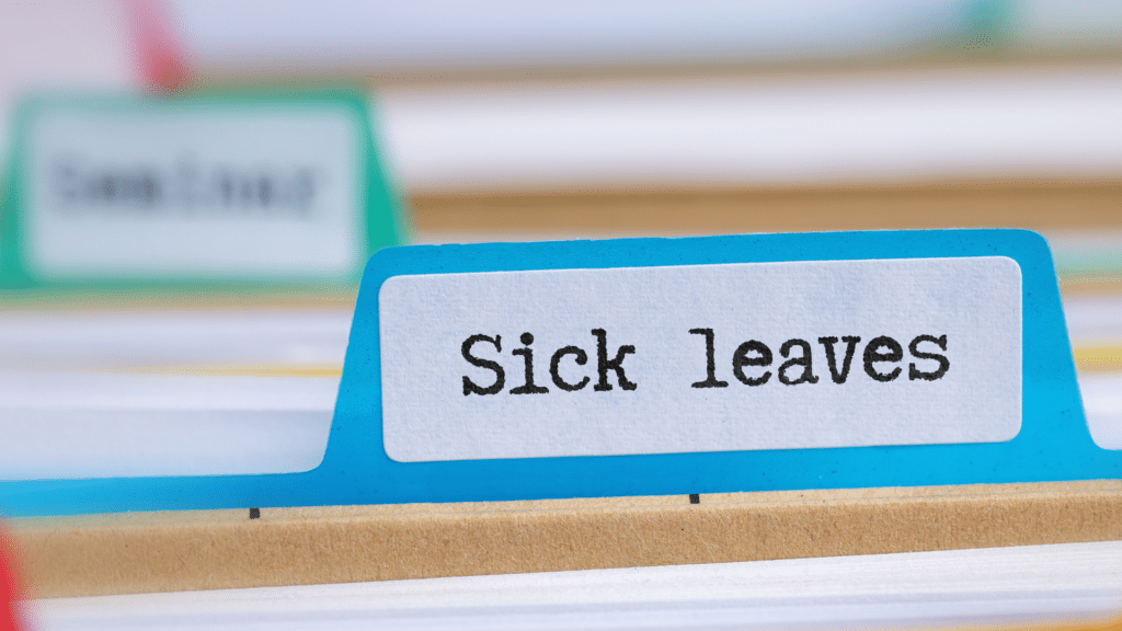 An image of a filing cabinet with a folder for various leave of absence requests including sick leave