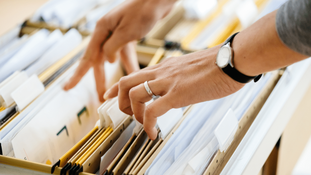 An image of a small business owner in London Ontario preparing her records for review.