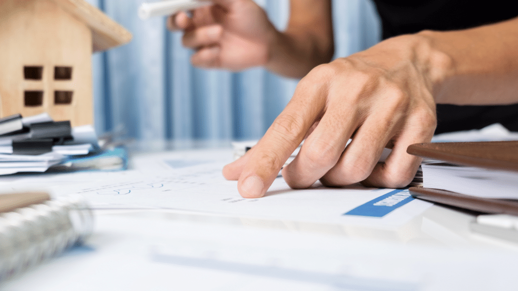 An image of a local London CPA reviewing a client's business valuation to help them sell their small business.