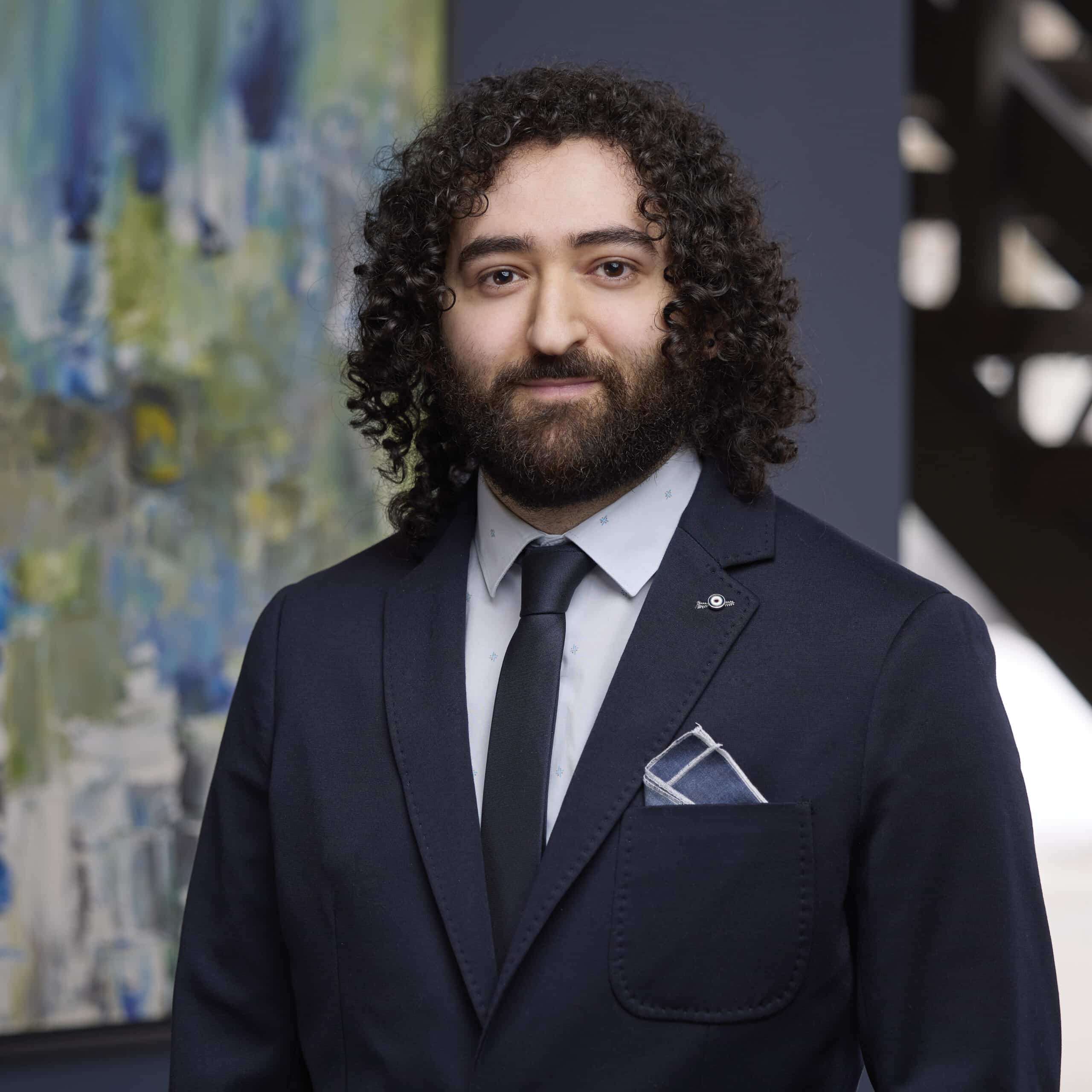 An image of MJ Al-Kirem in the Ford Keast LLP office in Ontario