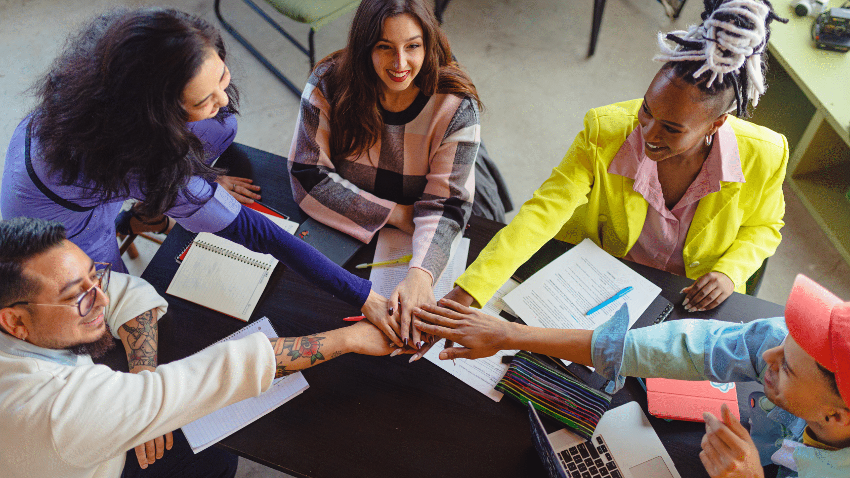 An image of a young team doing some strategic workforce planning for their small business.
