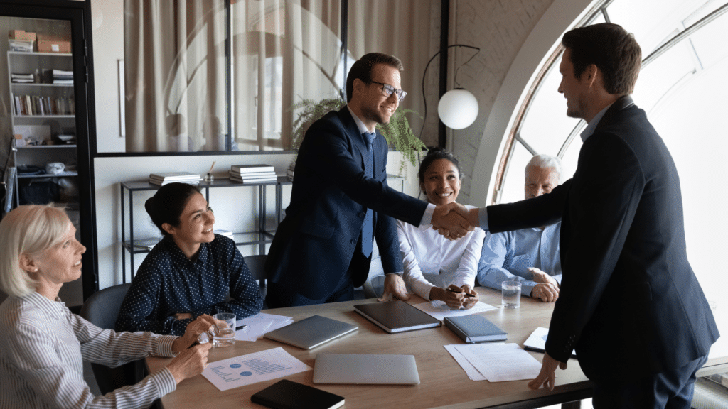 An image of a team discussing HR Topics in preparation for the summer season