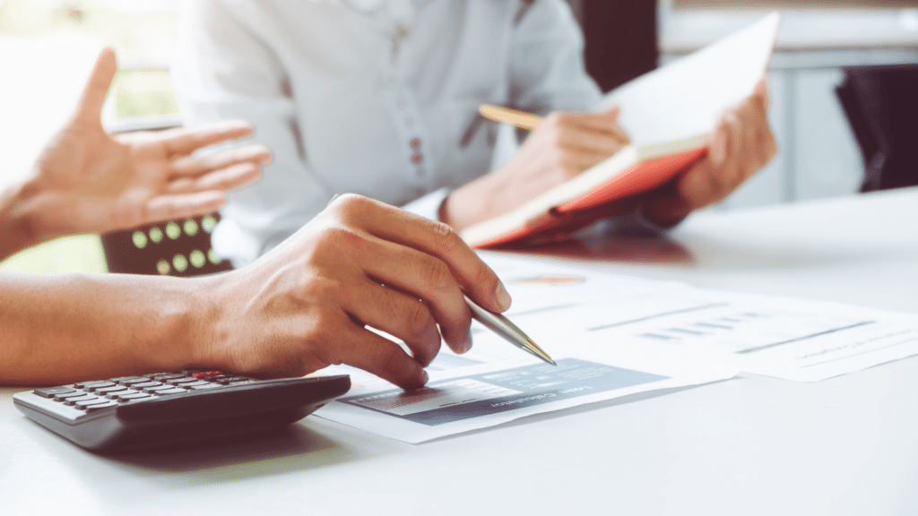 An image of an accountant and a small business owner working through a CRA Audit