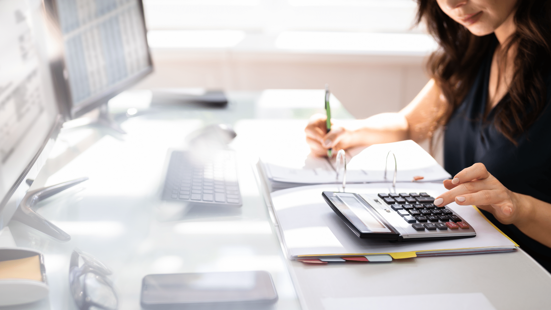 An image of a local London accountant helping a small business with their bank reconciliation