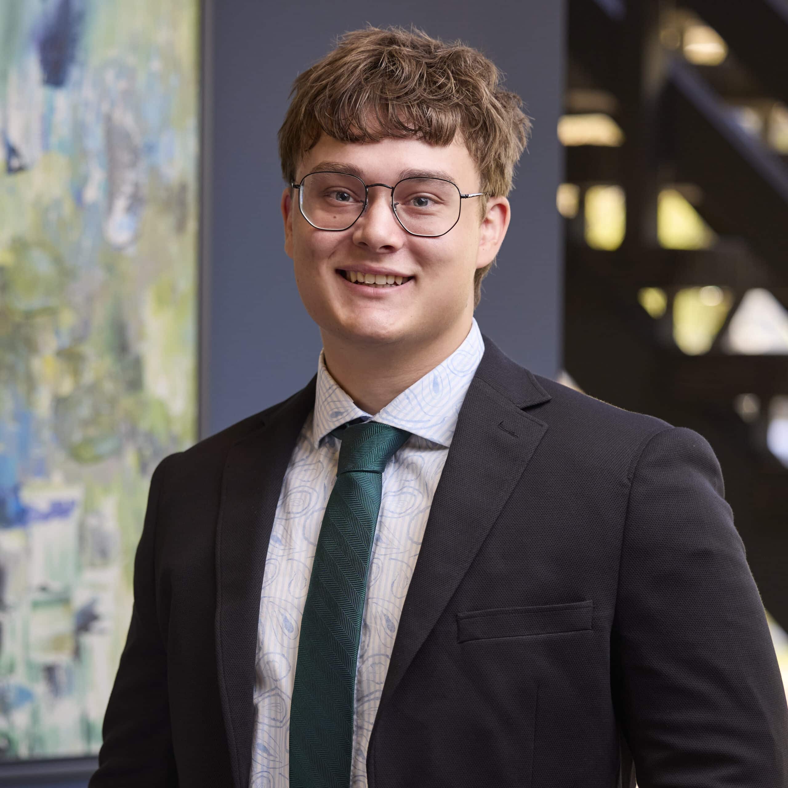 A thumbnail image of Ethan Guichelaar in the Ford Keast LLP office in London Ontario