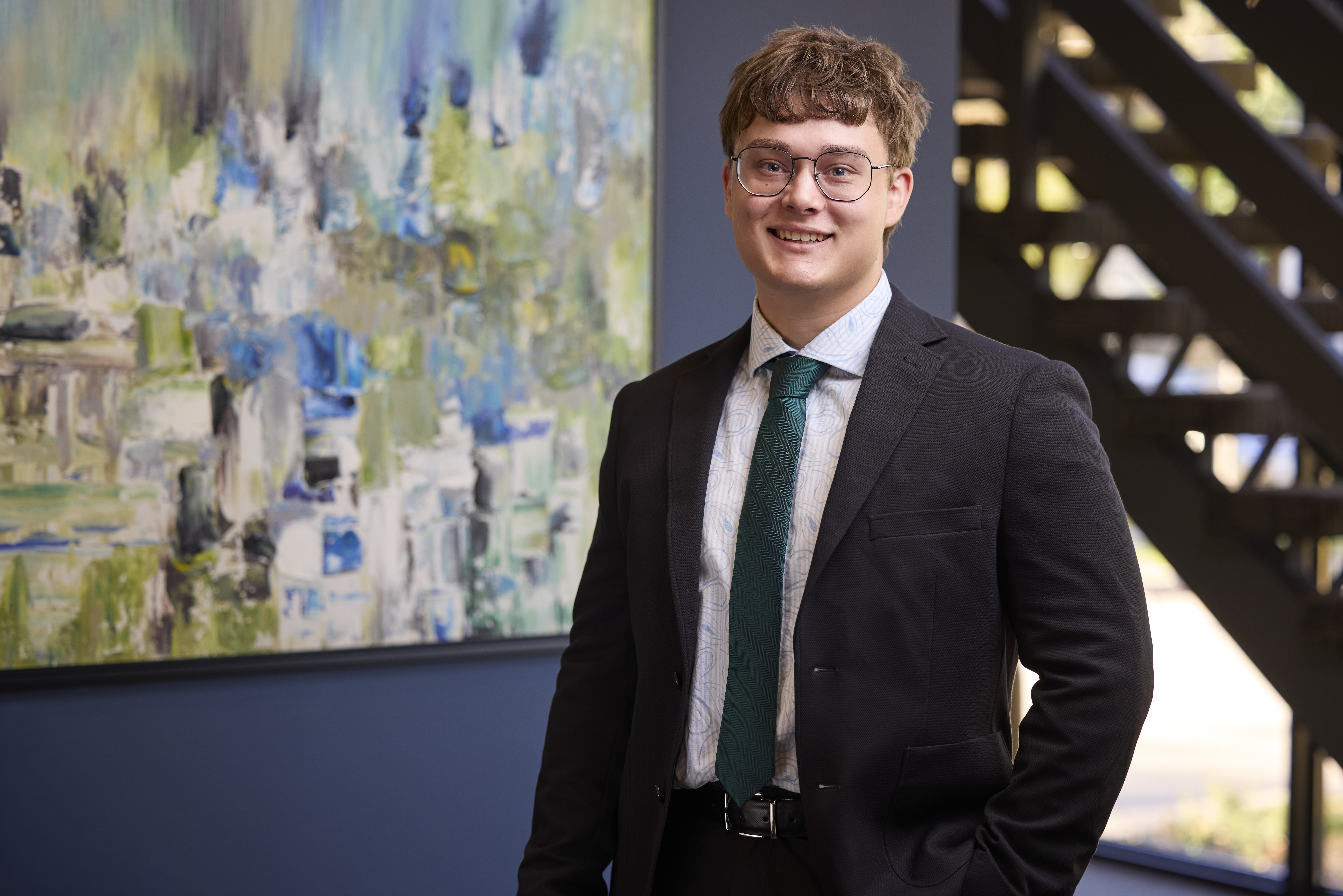 An image of Ethan Guichelaar in the Ford Keast LLP office in London Ontario