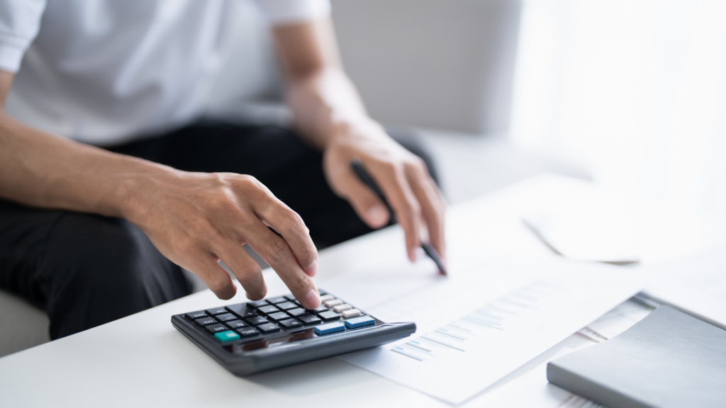 An image of a small business owner in London Ontario who is reviewing their income for the previous tax year.