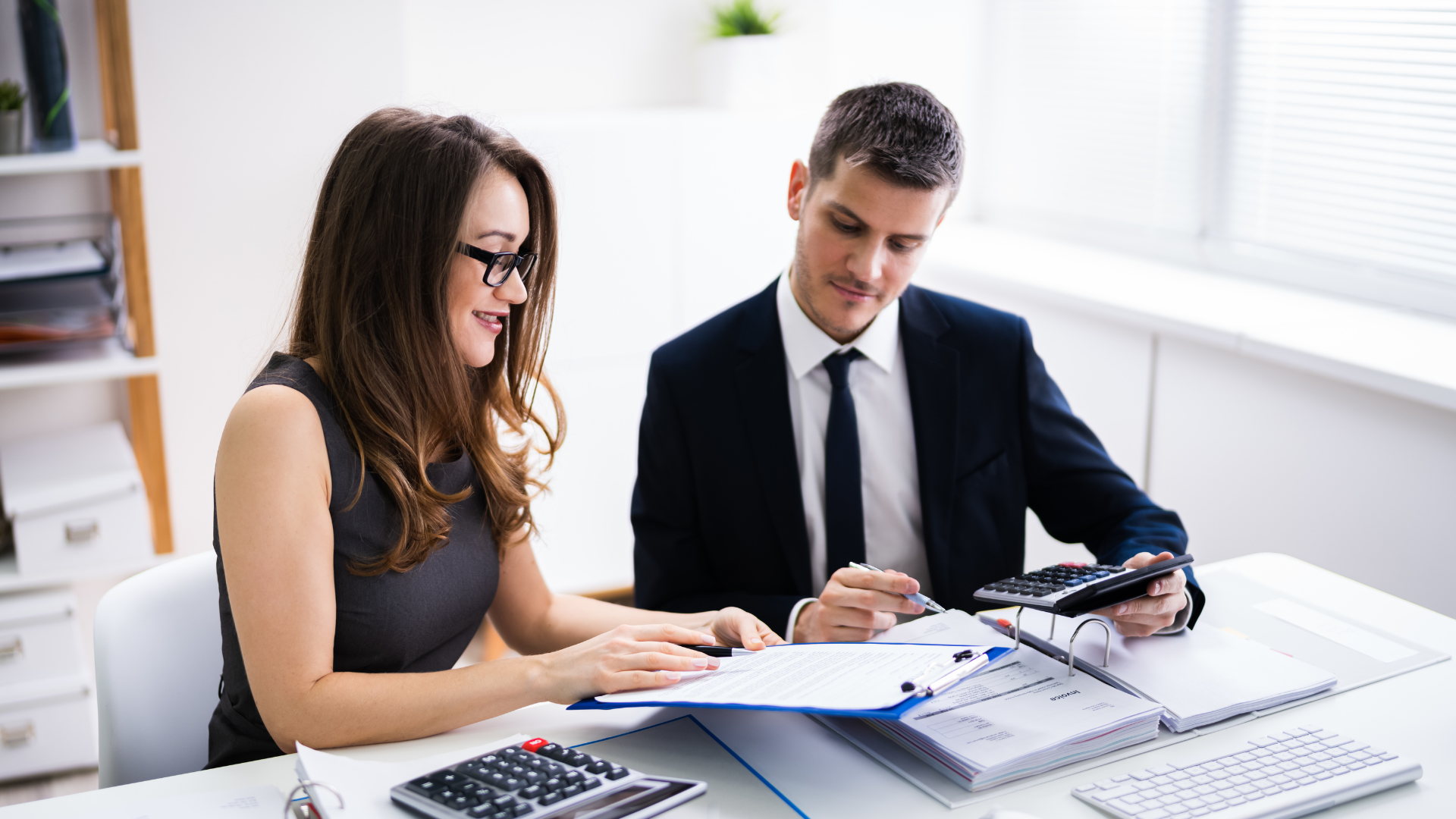 An image of a CPA in London who is offering some business consulting support for her client.