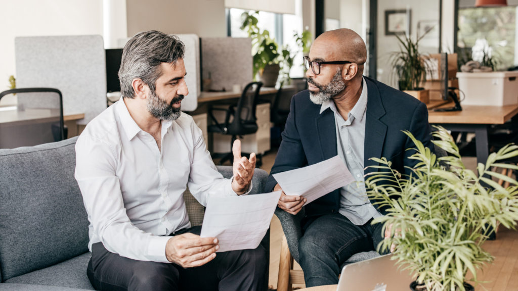 An image of an estate planner in London Ontario discussing inheritance with his client